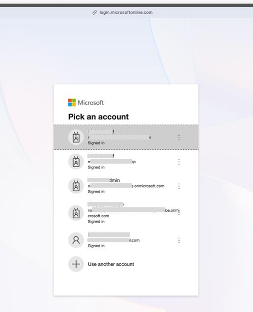 Microsoft Pick an account screen showing multiple signed-in accounts